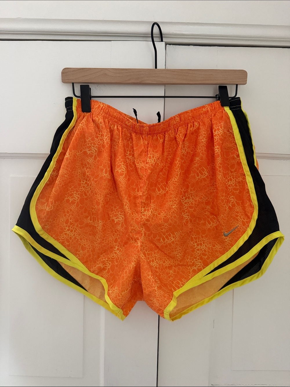 Nike Women's Orange Athletic Shorts with Yellow Trim